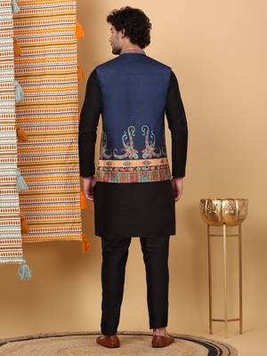 Silk blend black kurta and churidar with paisley printed navy blue nehru jacket 3