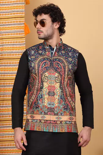 Silk blend black kurta and churidar with paisley printed navy blue nehru jacket
