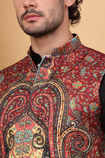 Silk blend black kurta and churidar with paisley printed maroon nehru jacket
