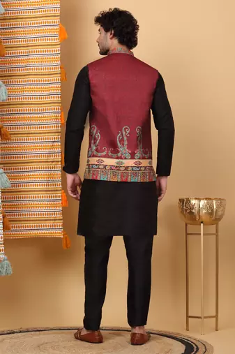 Silk blend black kurta and churidar with paisley printed maroon nehru jacket