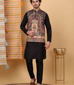 Silk blend black kurta and churidar with paisley printed black nehru jacket