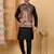Silk blend black kurta and churidar with paisley printed black nehru jacket