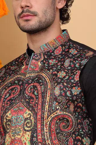 Silk blend black kurta and churidar with paisley printed black nehru jacket