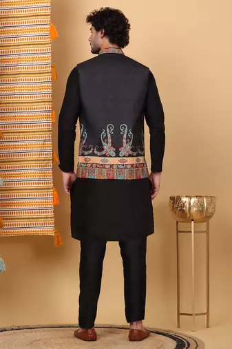 Silk blend black kurta and churidar with paisley printed black nehru jacket