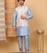 Silk blend sky blue kurta and churidar with embroidered cream nehru jacket