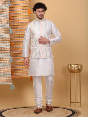 Silk blend cream kurta and churidar with embroidered cream nehru jacket 1
