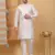 Silk blend cream kurta and churidar with embroidered cream nehru jacket