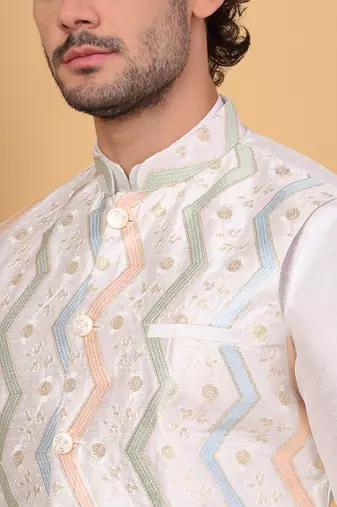 Silk blend cream kurta and churidar with embroidered cream nehru jacket