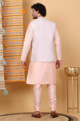 Silk blend peach kurta and churidar with embroidered cream nehru jacket