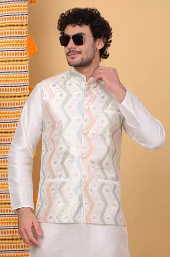 Silk blend cream kurta and churidar with embroidered cream nehru jacket