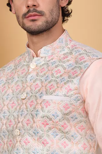Silk blend peach kurta and churidar with embroidered cream nehru jacket