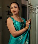 Teal chiffon floral block print beads lace border saree with unstitched blouse piece