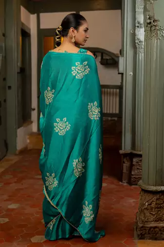 Teal chiffon floral block print beads lace border saree with unstitched blouse piece