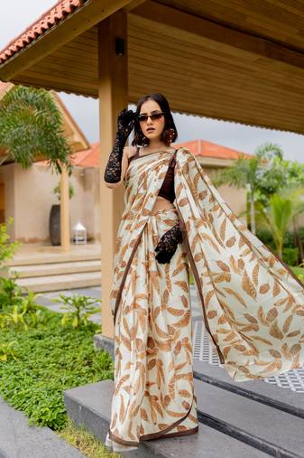 Cream satin georgette leaf print plain saree with unstitched blouse piece