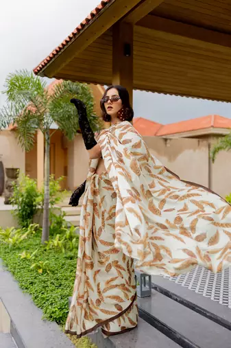 Cream satin georgette leaf print plain saree with unstitched blouse piece