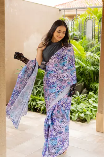 Light pink satin georgette animal print plain saree with unstitched blouse piece