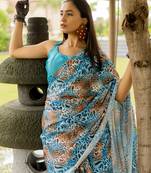 Turquoise blue satin georgette animal print plain saree with unstitched blouse piece