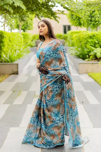 Turquoise blue satin georgette animal print plain saree with unstitched blouse piece
