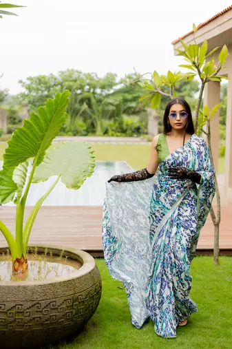 Off white satin georgette animal print plain saree with unstitched blouse piece