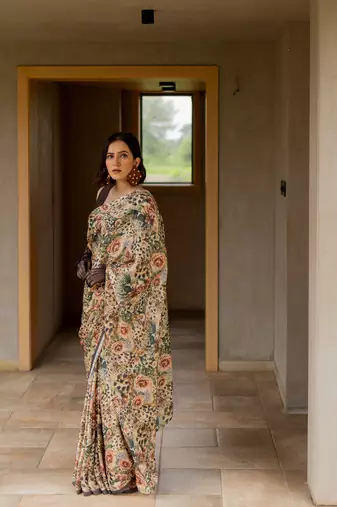 Cream satin georgette animal print floral print plain saree with unstitched blouse piece