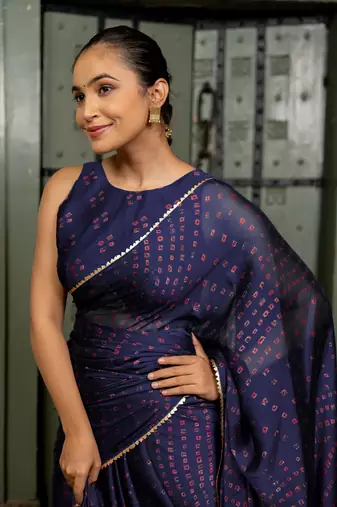 Dark purple chiffon bandhani print sequins lace border saree with unstitched blouse piece