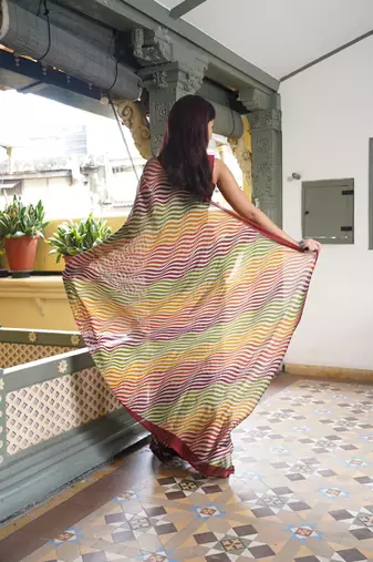 Multicolor chiffon leheriya print plain saree with unstitched blouse piece