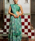 Teal green chiffon floral print saree with unstitched blouse piece