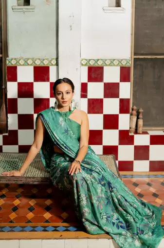 Teal green chiffon floral print saree with unstitched blouse piece