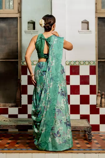 Teal green chiffon floral print saree with unstitched blouse piece