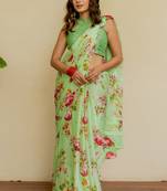 Light green chiffon floral print saree with unstitched blouse piece