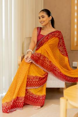 Orange georgette bandhani print stone work stone work border saree with unstitched blouse piece 3
