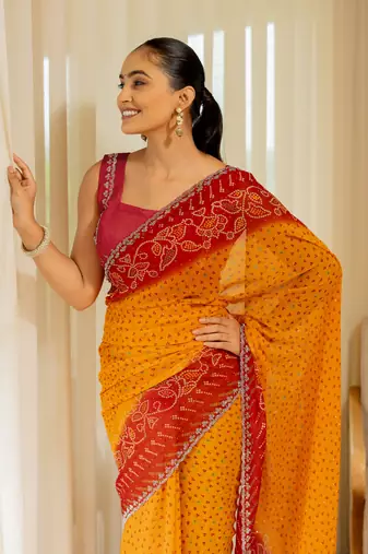 Orange georgette bandhani print stone work stone work border saree with unstitched blouse piece