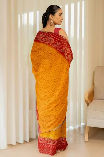 Orange georgette bandhani print stone work stone work border saree with unstitched blouse piece