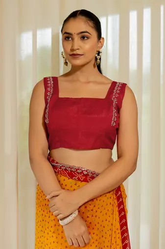 Orange georgette bandhani print stone work stone work border saree with unstitched blouse piece