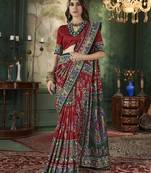 Maroon Woven designer with ikkat printed tussar silk saree with blouse piece