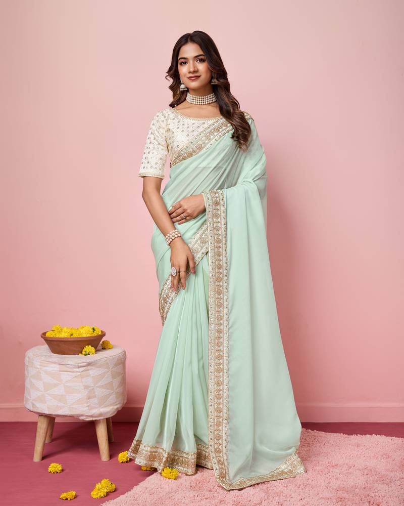 Sea green  embroidery work border,blouse organza saree with blouse piece