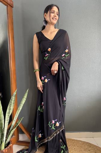 Black designer hand printed faux georgette saree with blouse piece