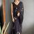Black designer hand printed faux georgette saree with blouse piece