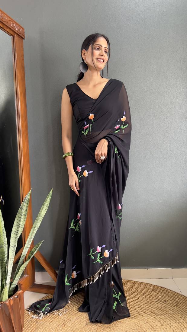 Black designer hand printed faux georgette saree with blouse piece