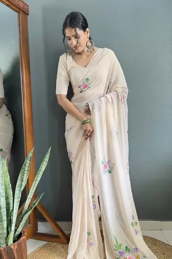 Cream designer hand printed faux georgette saree with blouse piece