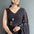 Black designer hand printed faux georgette saree with blouse piece