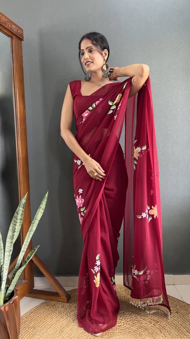 Maroon designer hand printed faux georgette saree with blouse piece