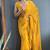 Mustard designer hand printed faux georgette saree with blouse piece