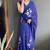 Blue designer hand printed faux georgette saree with blouse piece