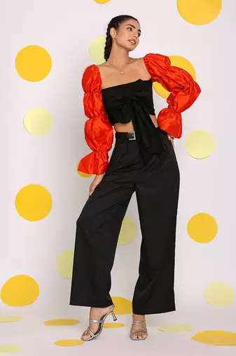 Black and orange statement puff sleeves top with front tie crop top