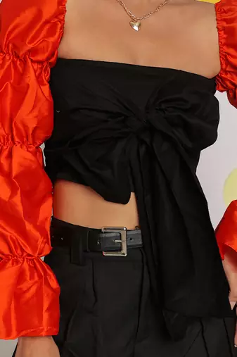 Black and orange statement puff sleeves top with front tie crop top