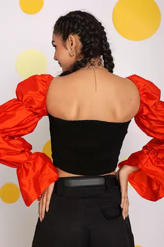 Black and orange statement puff sleeves top with front tie crop top