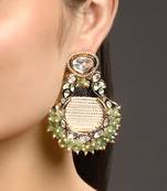 Green kundan and polki earrings