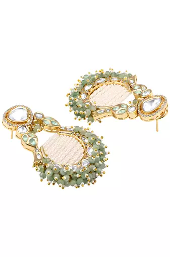 Green kundan and polki earrings