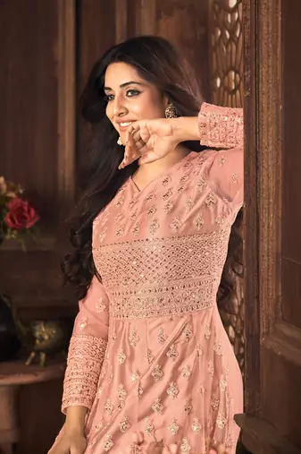 Striking Peach Net Semi-Stitched Festive Salwar Suits
